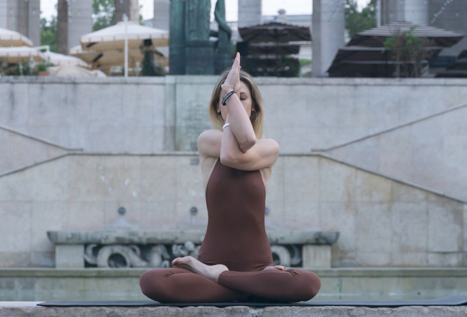 A student seated in a calm breathwork session
