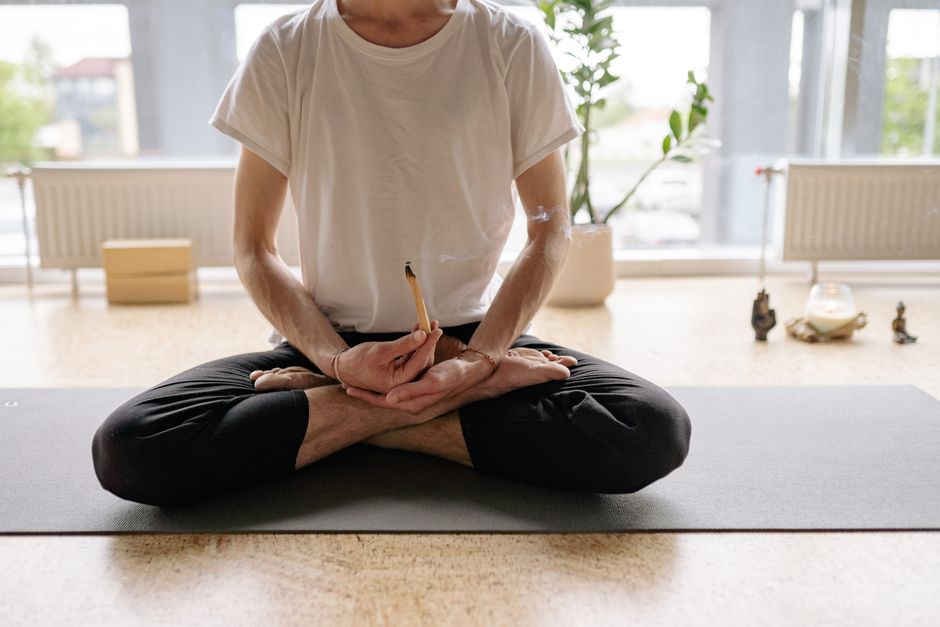 A student in a seated meditation session